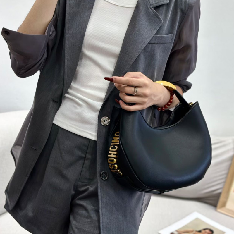 Halvemaanvormige dames handtas - Luxury Bags Office recensie en prijs