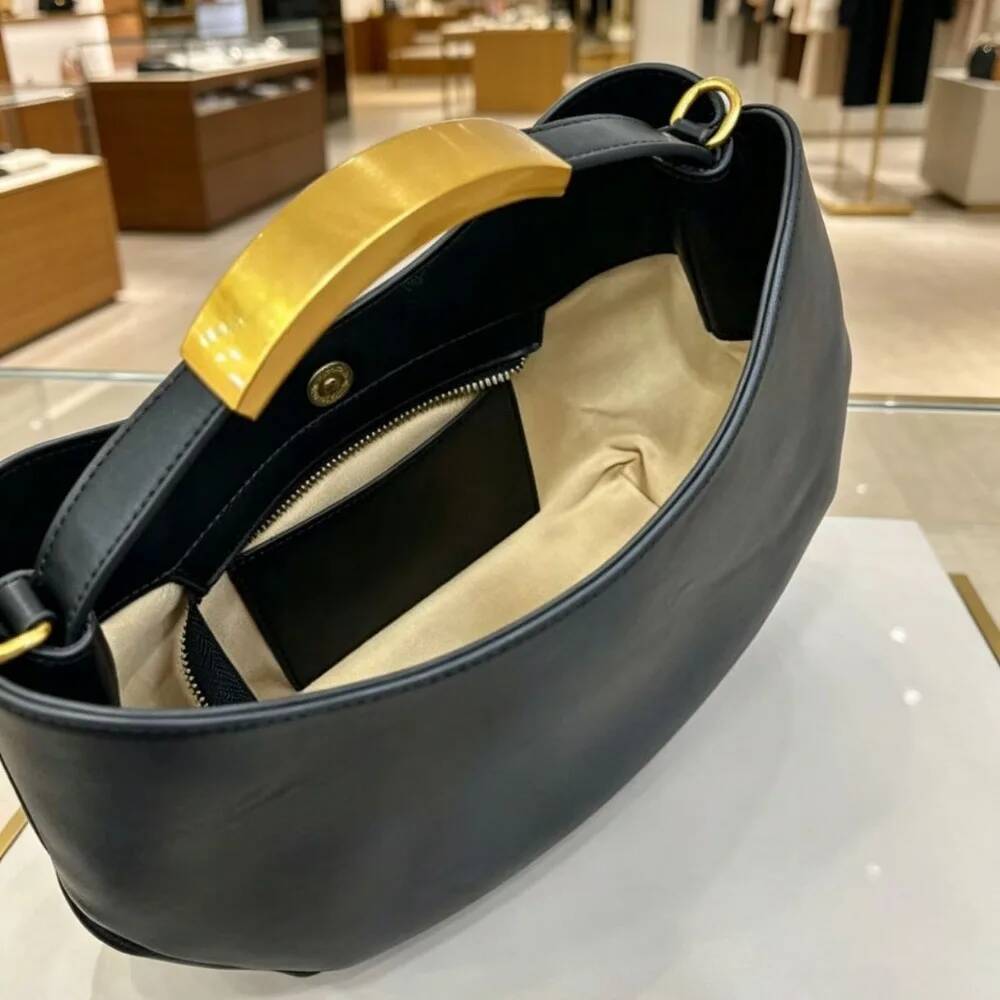 Halvemaanvormige dames handtas - Luxury Bags Office recensie en prijs